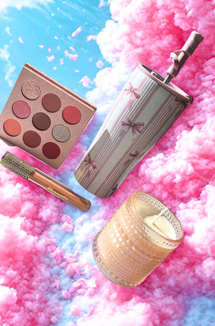 Eye shadow palette, lip gloss, and candle and 20 oz tumbler on a colorful cloud background