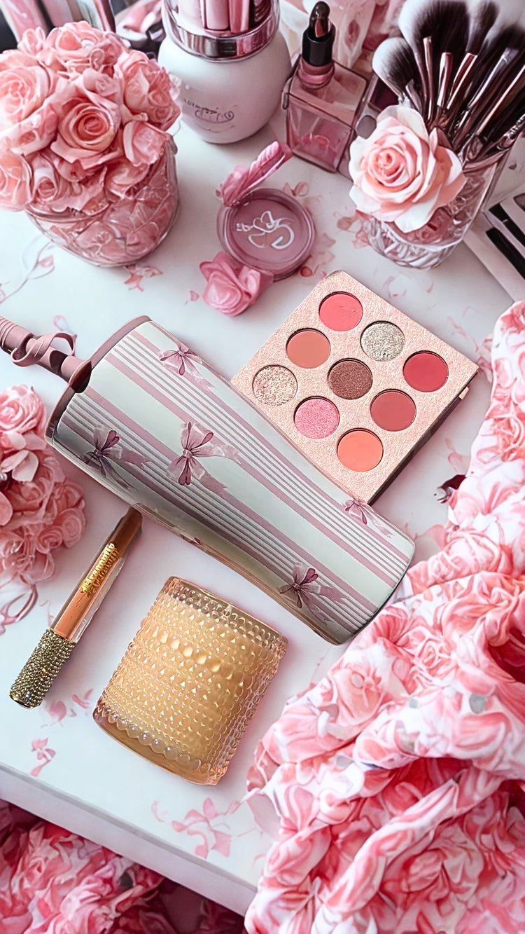 Princess collection includes Makeup products including a eye shadow palette, lip gloss, candle, and tumbler on a pink floral background