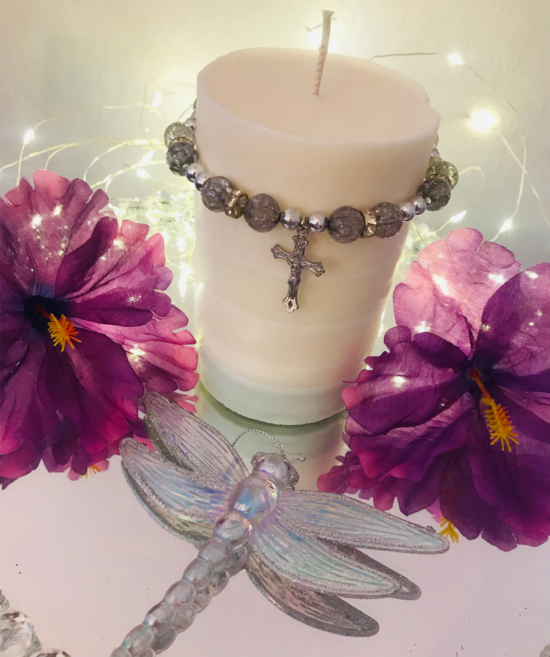 Pillar candle with bracelet