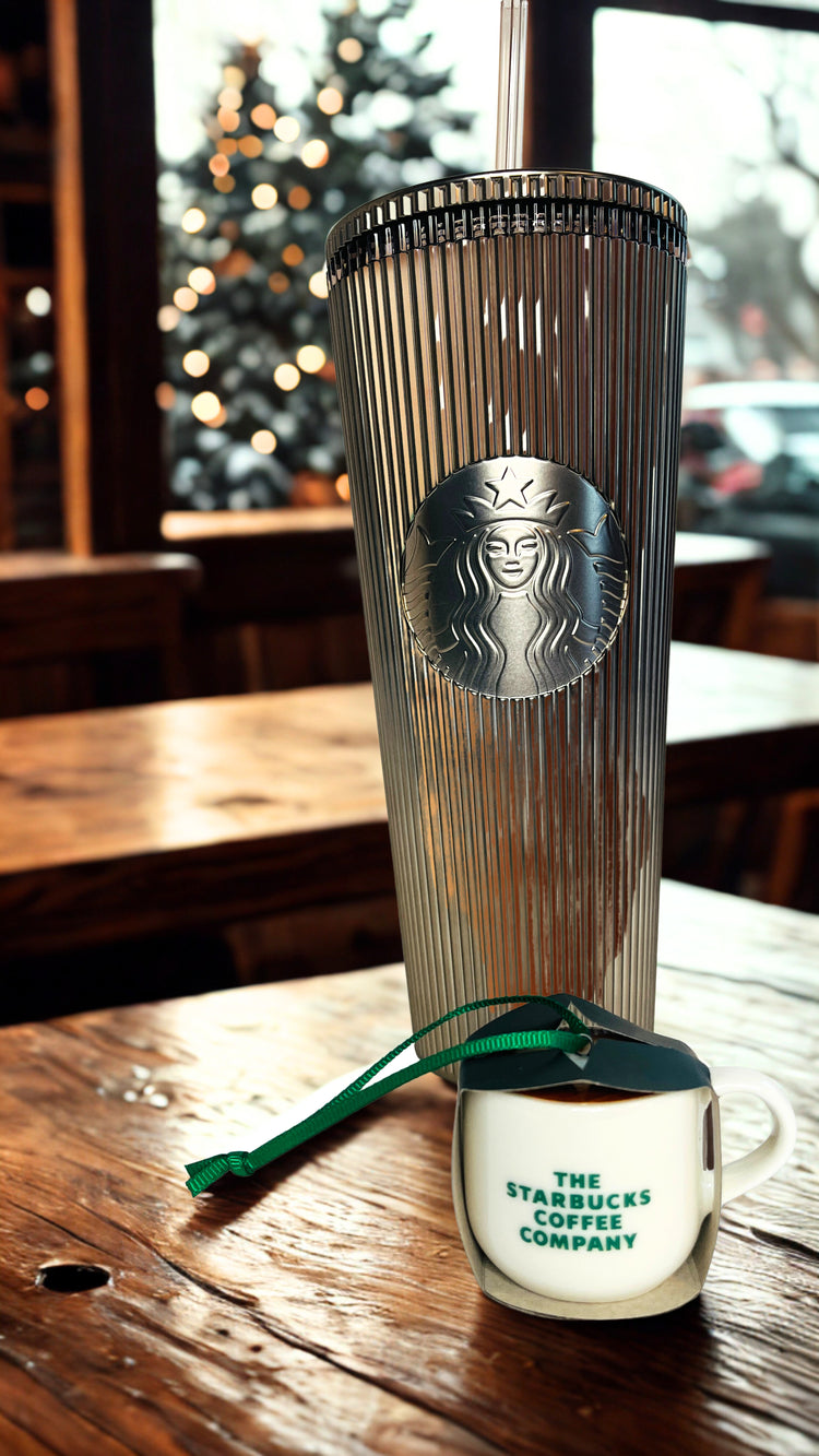 Starbucks coffee cup with lid on a wooden table, blurred background